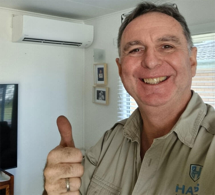 Paul Hayward from Hays Air Conditioning smiles after completing an air conditioning cleaning service in North Brisbane.